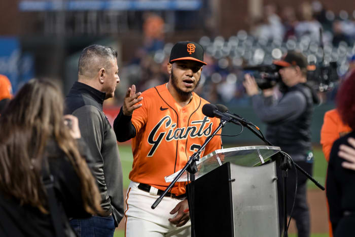 SF Giants second baseman Thairo Estrada (39) addresses the crowd after winning the WIllie Mac award before the game against the Los Angeles Dodgers at Oracle Park.